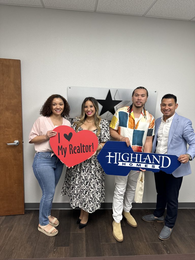 3 homebuyers celebrating their home financing with their lender Javier Hernandez